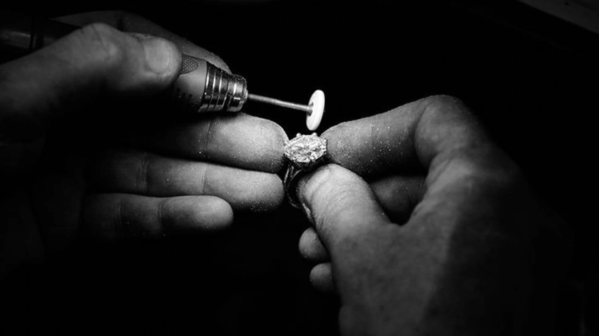 Gemologist inspecting ring
