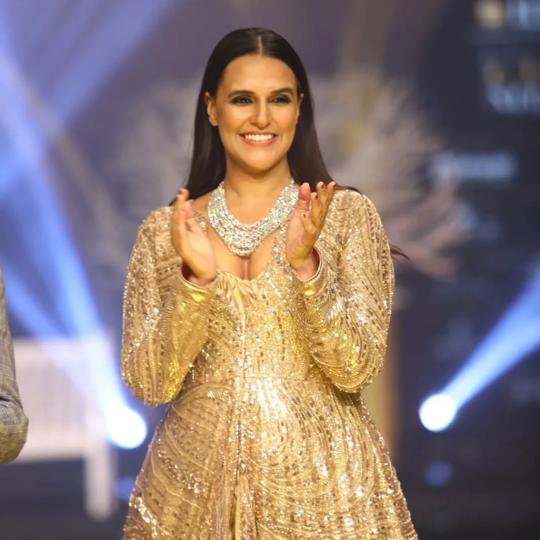 Celebrity in gold dress
